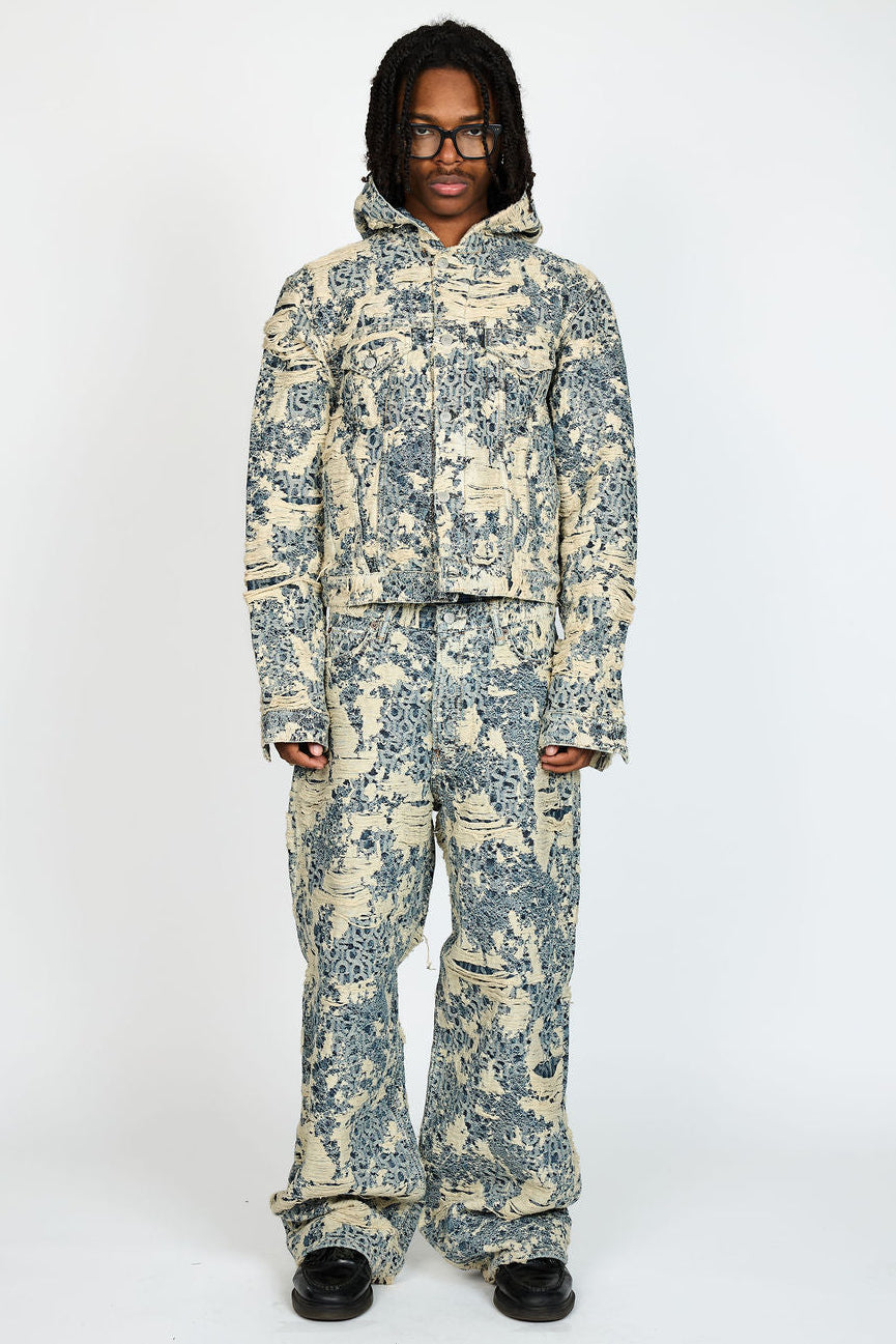 Acne Studios 1981 Distressed Monogram loose-fit jeans